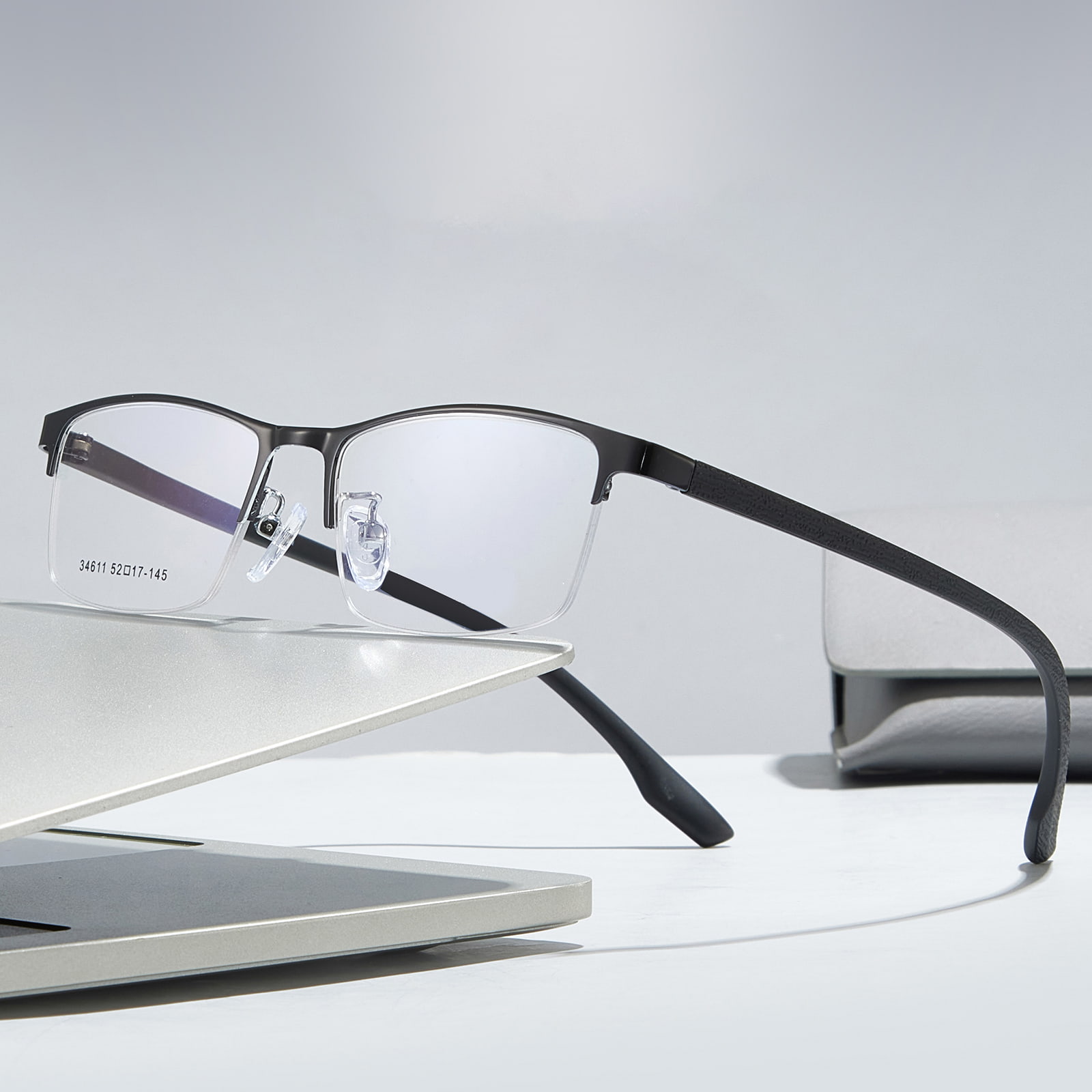 34611 Minimalistiske halvramme hypoallergene legeringsbriller