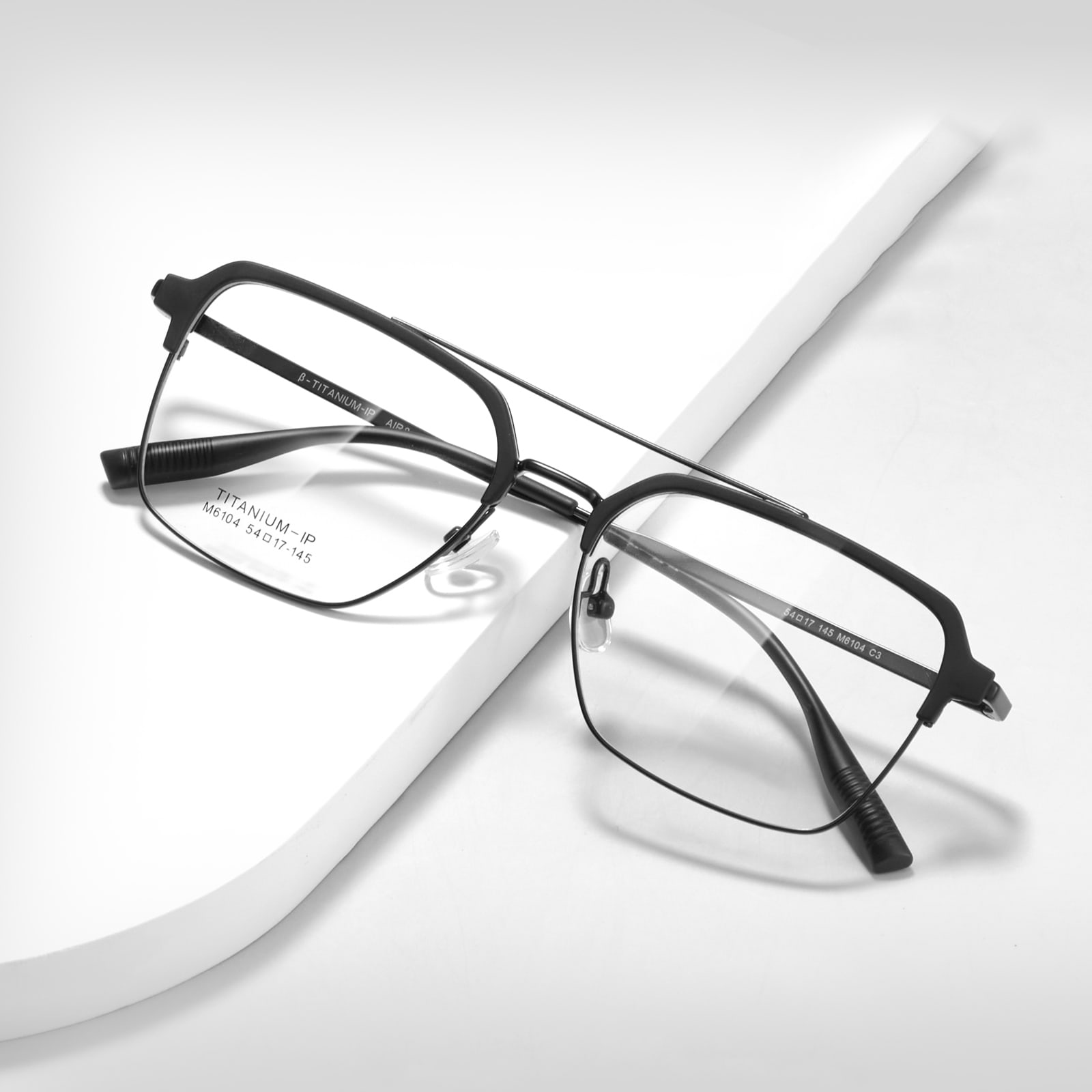 M6104 dobbeltstrålende ikke-fading blanke β titanbrille